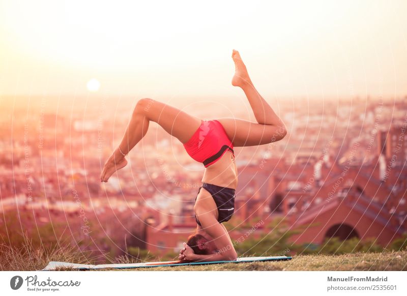 athletic woman working out outdoors Lifestyle Beautiful Health care Wellness Sports Woman Adults Park Fitness Athletic fit Copy Space Handstand Balance Mat