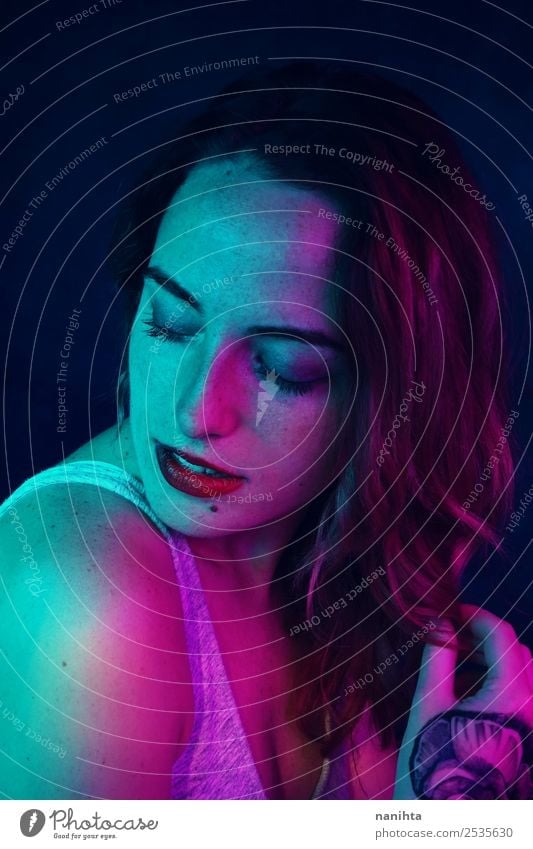 Artistic portrait of a woman with neon lights Elegant Style Design Beautiful Skin Face Make-up Freckles Human being Feminine Young woman Youth (Young adults)