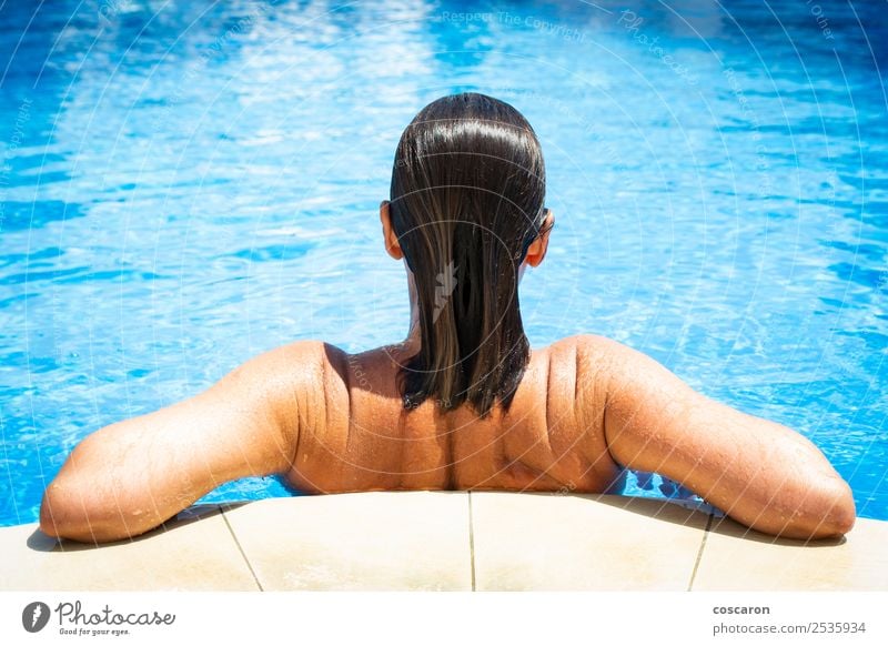 Woman from behind on the edge of a pool Lifestyle Style Beautiful Body Wellness Relaxation Spa Swimming pool Leisure and hobbies Vacation & Travel Summer Beach