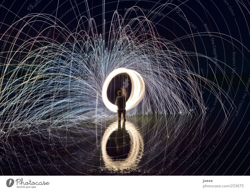 torque Masculine Man Adults 1 Human being Shows Water Rotate Illuminate Hot Crazy Black White Movement Energy flying sparks Firecracker Colour photo
