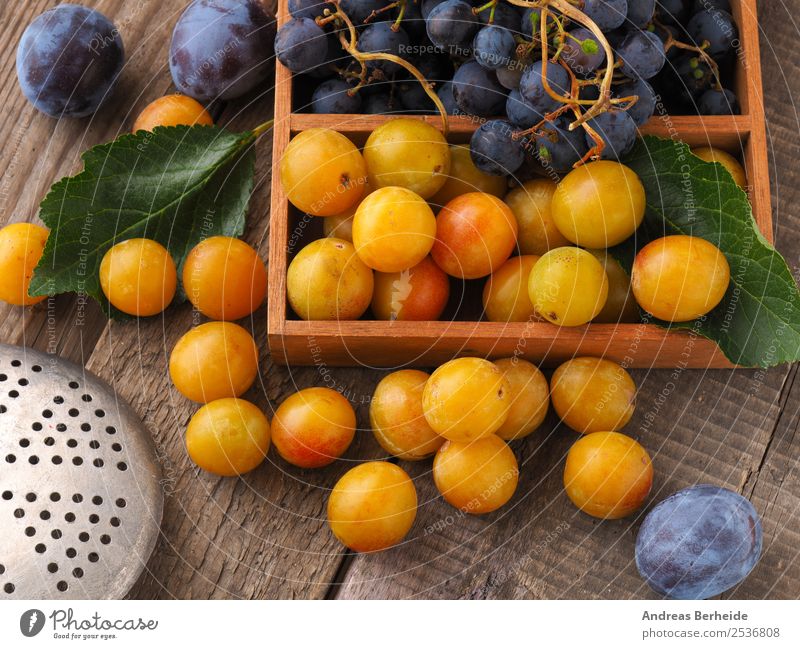 Mirabelle plums, plums and grapes Food Fruit Dessert Organic produce Vegetarian diet Diet Healthy Eating Summer Nature Delicious Yellow plum organic Planning