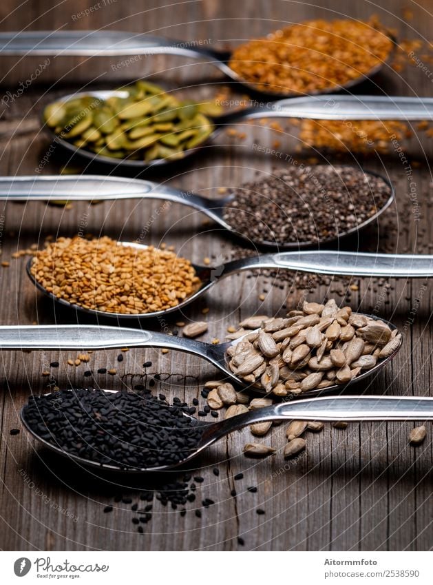 Spoons with assortment of seeds Food Nutrition Vegetarian diet Diet Exotic Health care Collection Exceptional Fresh Delicious Natural Many Black Creativity