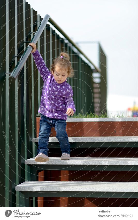 Little 20-month-old girl going down some stairs Lifestyle Joy Happy Beautiful Leisure and hobbies Playing Climbing Mountaineering Child Human being Toddler Girl