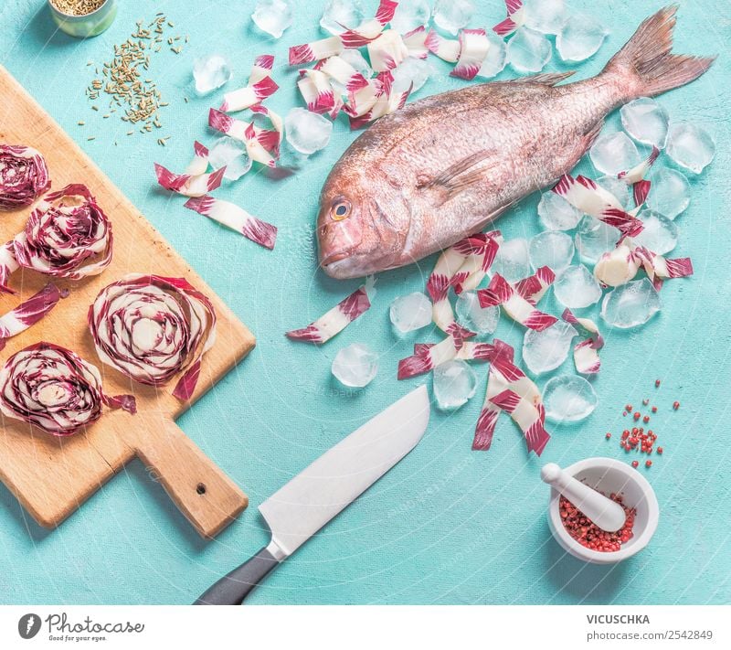 Rosa Dorado fish with knife and ingredients Food Fish Vegetable Herbs and spices Nutrition Organic produce Vegetarian diet Diet Knives Style Design