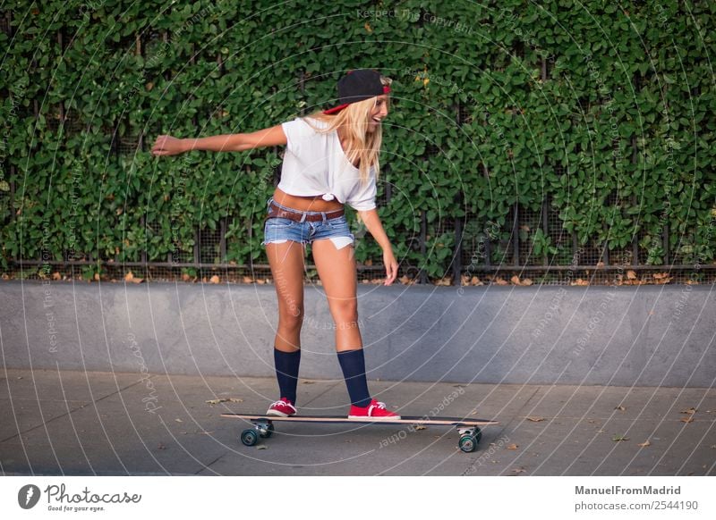 young woman skating Lifestyle Style Joy Happy Beautiful Summer Woman Adults Street Fashion Blonde Smiling Cool (slang) Hip & trendy casual riding Skateboard