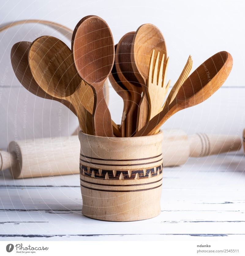various wooden objects Cutlery Fork Spoon Table Kitchen Tool Sieve Wood Brown White Tradition food background utensils cooking space eat equipment Domestic