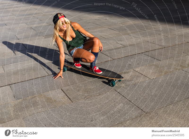 young woman skating Lifestyle Style Joy Beautiful Leisure and hobbies Summer Woman Adults Downtown Street Sunglasses Blonde Smiling Cool (slang) Eroticism