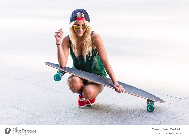 young skater woman in the street Lifestyle Style Joy Beautiful Summer Woman Adults Downtown Street Sunglasses Blonde Smiling Cool (slang) Eroticism Hip & trendy