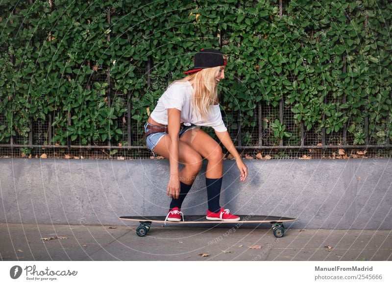 young cheerful woman skating in the street Lifestyle Style Joy Beautiful Leisure and hobbies Summer Sports Woman Adults Downtown Street Blonde Cool (slang)