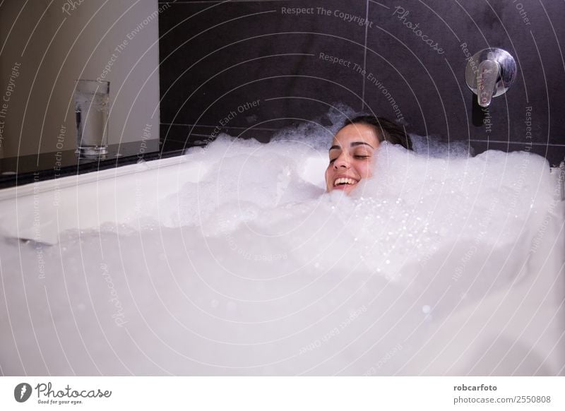 Woman taking a bath of foam Happy Beautiful Body Skin Relaxation Calm Spa Bathtub Bathroom Human being Adults Brunette Smiling Eroticism Happiness Clean White