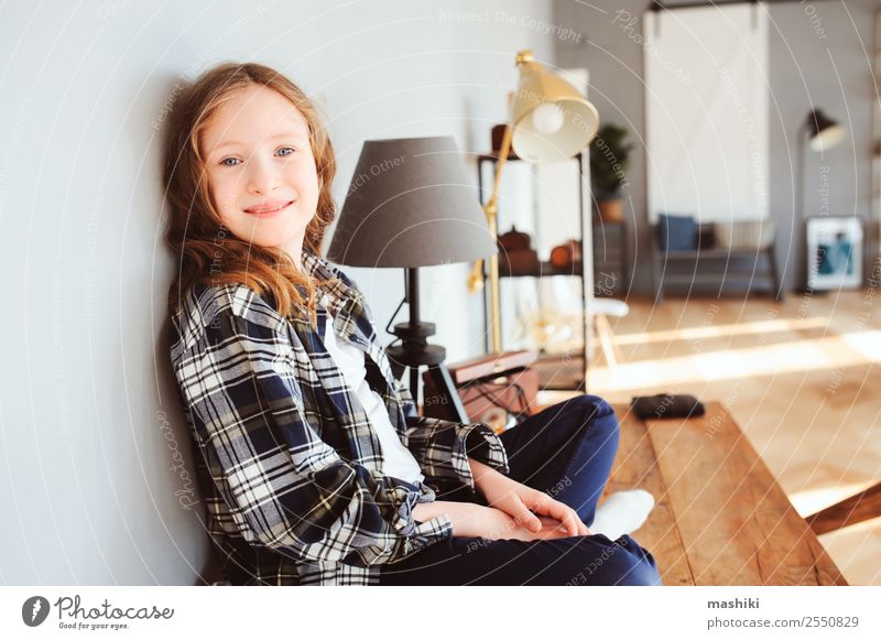 happy kid girl sitting on table at home Lifestyle Table Success Child School Study Schoolchild Infancy Book Pen Smiling Write Sit Smart Interest Creativity