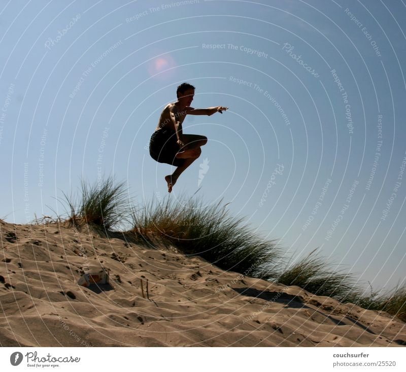 Kiss the sky Jump Ocean Grass Man Sky Sand Beach dune Air grap Aviation Trick jump
