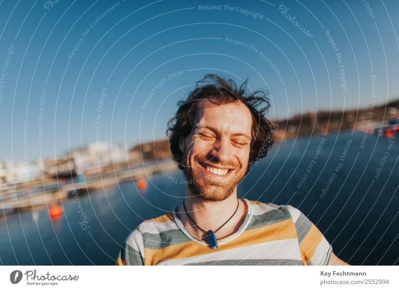 Portrait of happy laughing man at the lake Lifestyle Joy Happy Contentment Vacation & Travel Freedom Summer Summer vacation University & College student