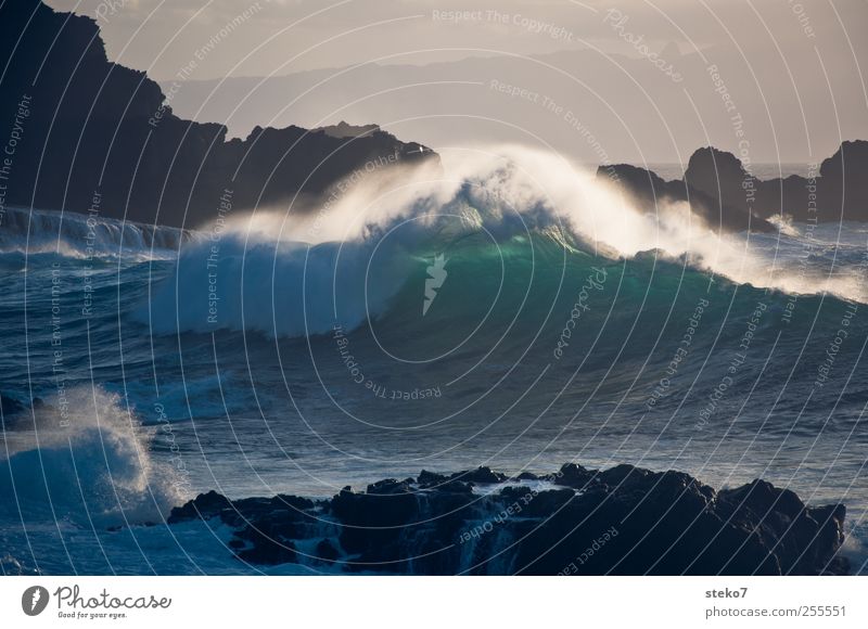 wave follow up Water Sky Wind Rock Waves Coast Ocean Blue Green Surf White crest Foam To break (something) Cliff Colour photo Exterior shot Deserted