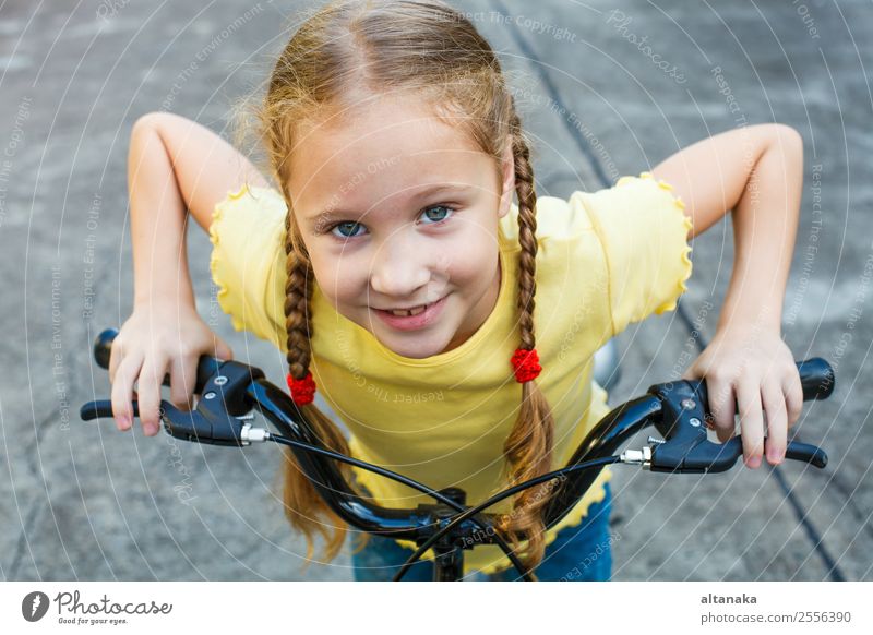 happy child on a bicycle Lifestyle Joy Happy Beautiful Face Leisure and hobbies Playing Vacation & Travel Summer Sports Cycling Child Human being