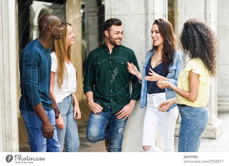 Multi-ethnic group of young people having fun together outdoors Lifestyle Joy Happy Beautiful Summer Human being Young woman Youth (Young adults) Young man