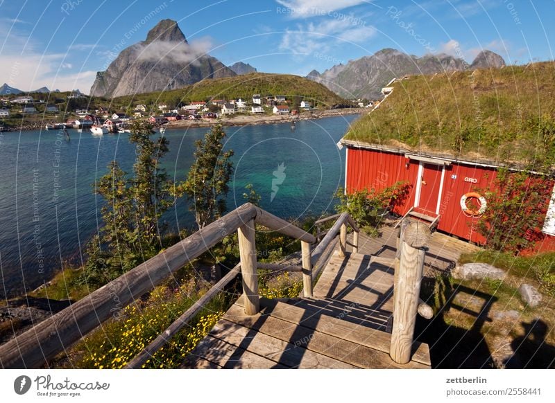 Reinebringen at Reine cleaning Mountain Arctic Ocean Europe falun red Rock Vacation & Travel Harbour House (Residential Structure) Sky Heaven Wooden house