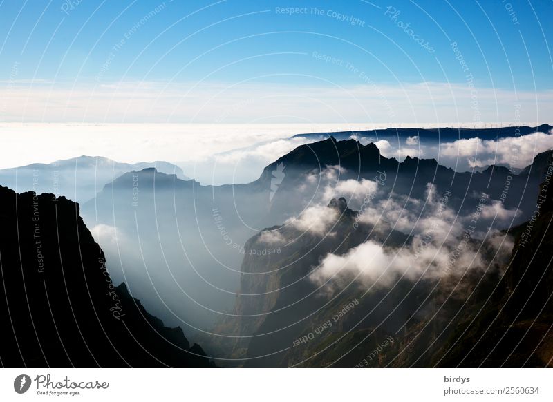 Overview of the Nature Landscape Elements Sky Clouds Rock Mountain Peak Madeira Authentic Tall Above Positive Blue Gray Black White Humble Adventure Loneliness