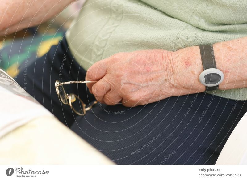 Pensioner's hand with glasses Healthy Care of the elderly Woman Adults Female senior Male senior Man Grandparents Senior citizen Grandmother Life Arm Hand