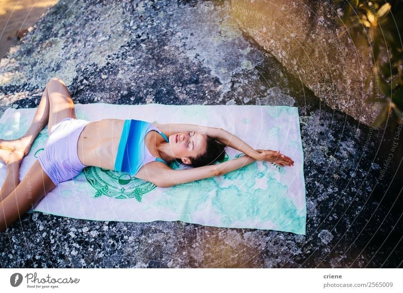 young woman doing yoga exercise at coast Lifestyle Beautiful Body Relaxation Meditation Vacation & Travel Summer Sun Beach Ocean Sports Yoga Human being Woman
