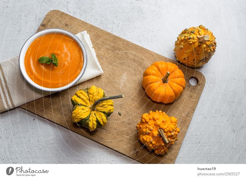 Cream of pumpkin in bowl Food Vegetable Soup Stew Dinner Vegetarian diet Diet Plate Bowl Spoon Healthy Eating Autumn Delicious Above Sour Yellow Tradition