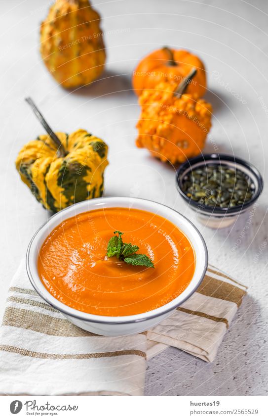 Cream of pumpkin in bowl Food Vegetable Soup Stew Dinner Vegetarian diet Diet Plate Bowl Spoon Healthy Eating Nature Autumn Beautiful Delicious Sour Yellow