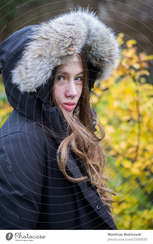 Young woman with fur cap Human being Feminine Youth (Young adults) Adults 1 18 - 30 years Smiling Looking Beautiful Uniqueness Natural Yellow Gray