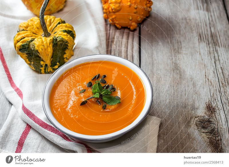 Cream of pumpkin in bowl. Food Vegetable Soup Stew Dinner Vegetarian diet Diet Plate Bowl Spoon Healthy Healthy Eating Hallowe'en Autumn Delicious Natural Sour