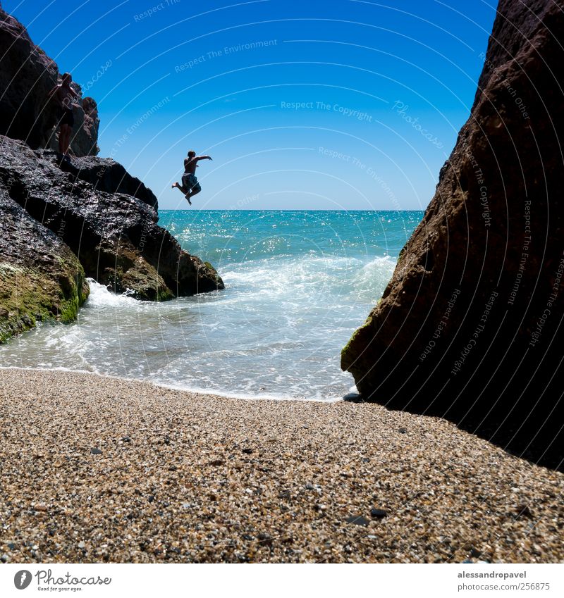 jumping 2 Human being Coast Beach Bay Blue Green Happy Joie de vivre (Vitality) Cool (slang) Vacation & Travel Andalucia Spain Colour photo Exterior shot Day