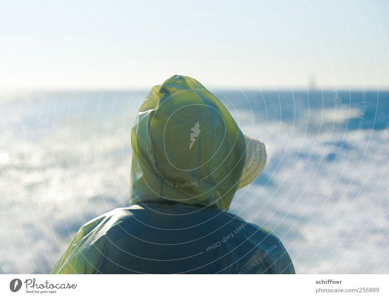 The old woman and the sea Human being 1 Water Sun Beautiful weather Waves Ocean Loneliness To enjoy Far-off places Hat Raincoat Hooded (clothing) Hooded jacket