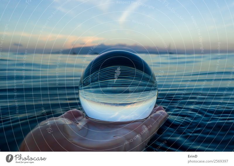 Stripes in Surface of Sea Close Up in Glass Ball Calm Vacation & Travel Ocean Waves Hand Environment Nature Landscape Sky Virgin forest Sphere Wet Blue Serene
