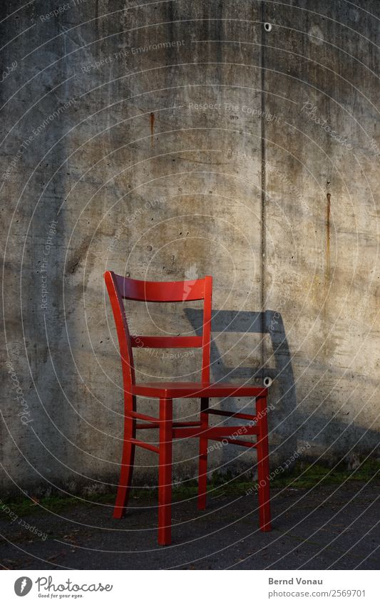 Red Chair Concrete Wood Authentic hot stool red chair Wall (building) Shadow Wait Empty Old Vintage Retro Gray Colour photo Exterior shot Deserted