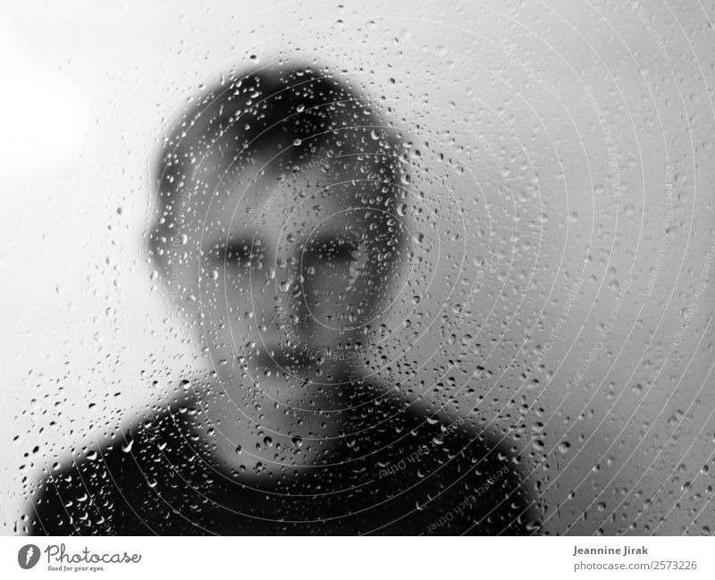 Boy portrait with raindrops Masculine Boy (child) Infancy Youth (Young adults) Drops of water Rain Looking Wait Gloomy Protection Sadness Disappointment