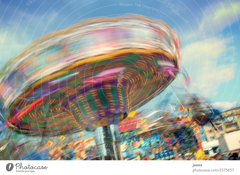Colourful, rotating chain carousel at a fair Joy Leisure and hobbies Feasts & Celebrations Oktoberfest Fairs & Carnivals Rotate To swing Happiness Multicoloured
