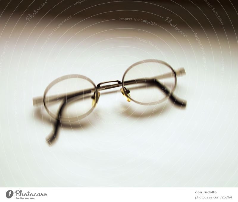 Glasses in front of white Eyeglasses Blur Brownish Monochrome Graphic Living or residing Black & white photo