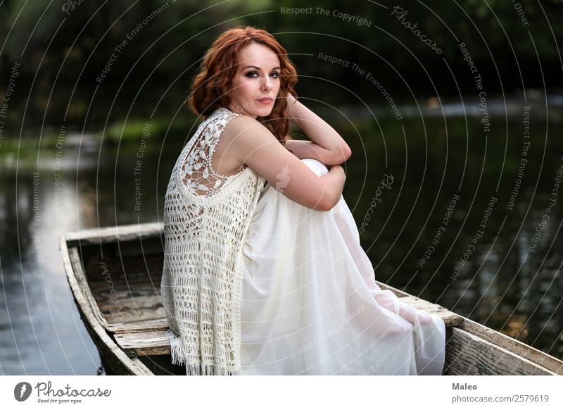 Young woman in the boat Portrait photograph Youth (Young adults) Girl Woman Sit Watercraft Attractive Beautiful Beauty Photography Dramatic Adults Human being