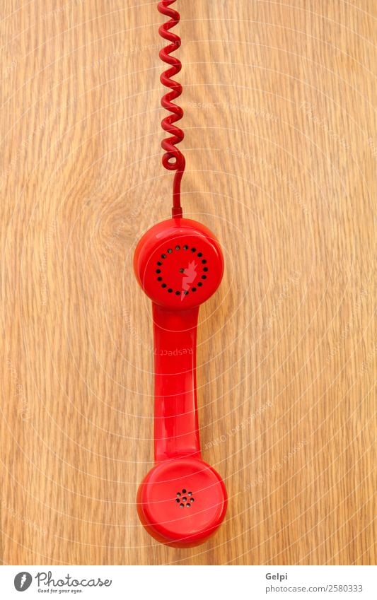 Old red phone Office Telecommunications Business Telephone Wood Plastic Line Listening Communicate To call someone (telephone) Retro Brown Red Colour Contact
