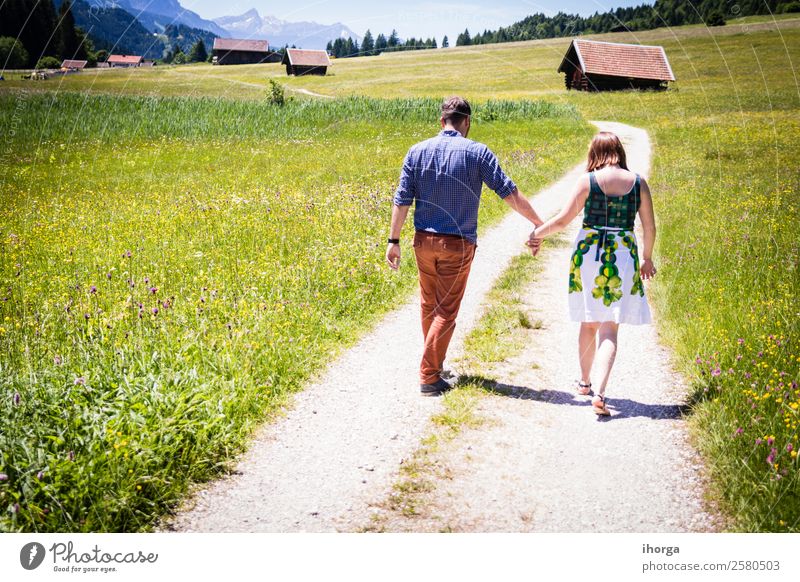 happy lovers on Holiday in the alps mountains Lifestyle Happy Beautiful Relaxation Vacation & Travel Adventure Summer Mountain Human being Woman Adults Man