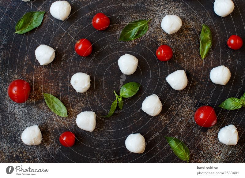 Italian cheese mozzarella with tomatoes and basil Nutrition Vegetarian diet Bowl Ball Wood Soft Green Red White Tradition Meal mediterranean Mozzarella Apulia