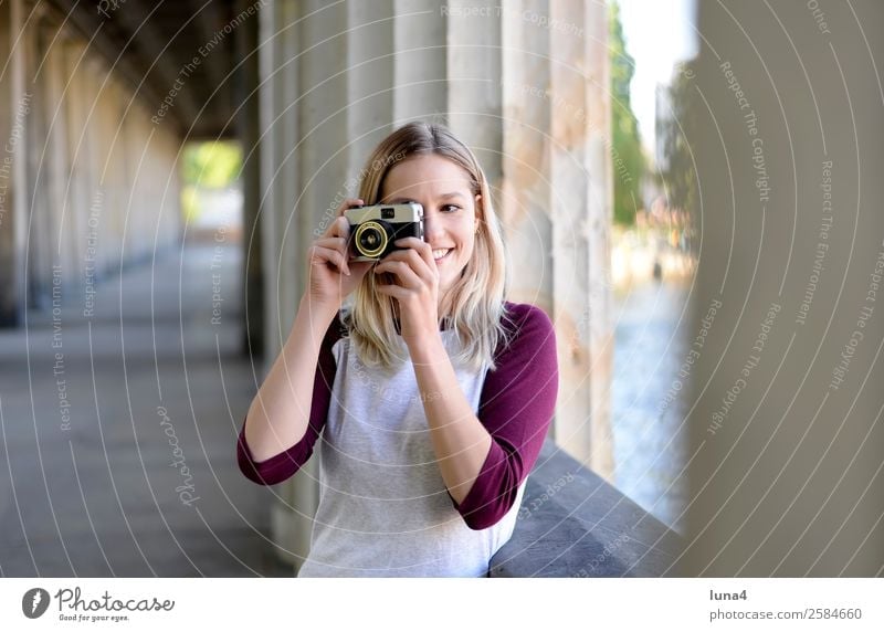 Woman with old camera Lifestyle Joy Happy Beautiful Contentment Leisure and hobbies Tourism Summer Camera Young woman Youth (Young adults) Adults Water River
