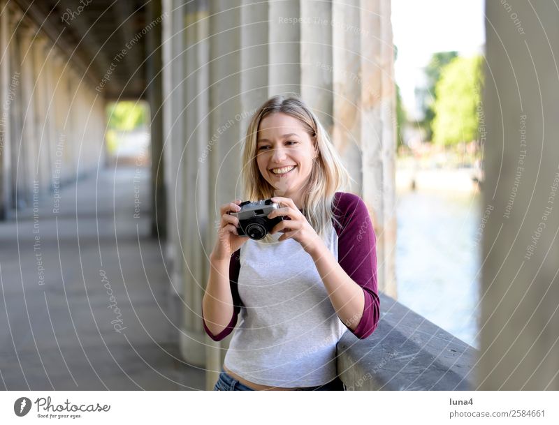 Woman with old camera Lifestyle Joy Happy Beautiful Contentment Leisure and hobbies Tourism Summer Camera Young woman Youth (Young adults) Adults Water River