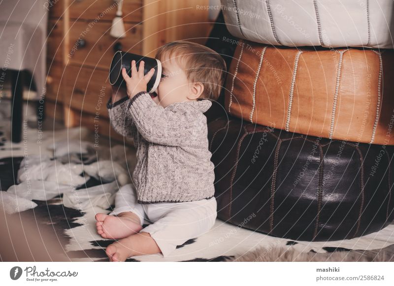 cute baby boy playing with cup at home Tea Lifestyle Style Happy Playing Winter Bedroom Child Baby Boy (child) Infancy Warmth Sweater Sit Small Modern Cute Home