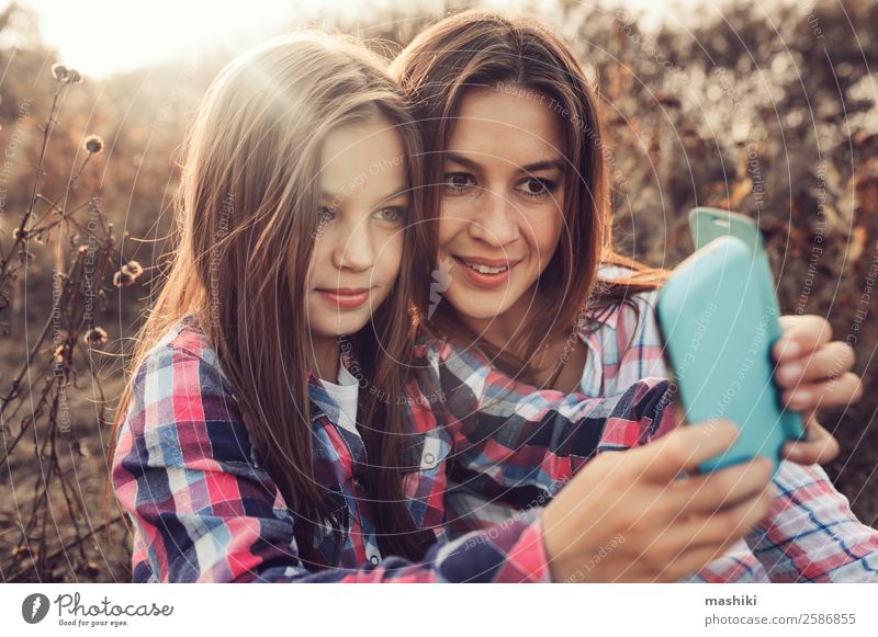 happy mother and daughter making selfie outdoor Lifestyle Joy Happy Vacation & Travel Summer Telephone Parents Adults Mother Family & Relations Nature Autumn