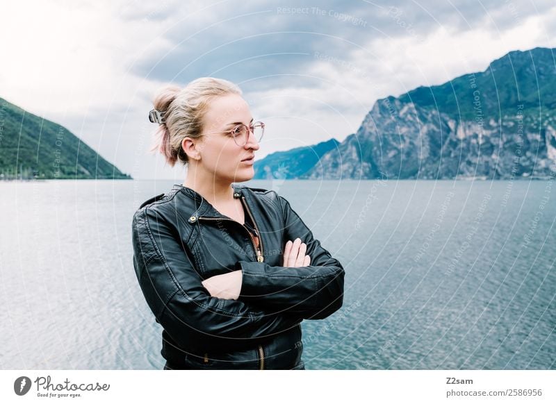 Young woman Portrait of Lake Garda Lifestyle Elegant Style Youth (Young adults) 30 - 45 years Adults Nature Landscape Storm clouds Autumn Bad weather Mountain