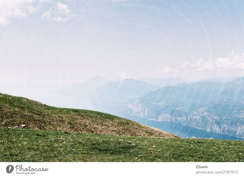 Monte Baldo Lake Garda. Environment Nature Landscape Sky Beautiful weather Meadow Alps Mountain Peak Gigantic Infinity Sustainability Warmth Blue Green Calm