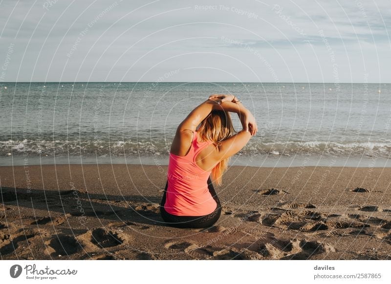 Sportsgirl stretching at the beach. Lifestyle Body Health care Athletic Wellness Well-being Summer Beach Ocean Fitness Sports Training Yoga Human being Feminine