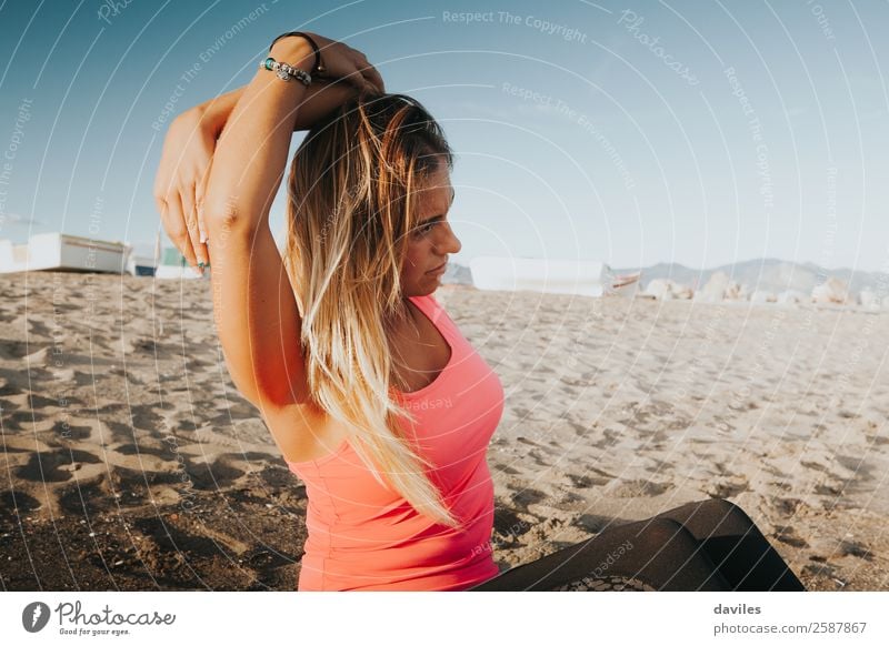 Blonde girl stretching on the beach. Lifestyle Athletic Fitness Well-being Summer Beach Sports Sports Training Yoga Human being Feminine Young woman