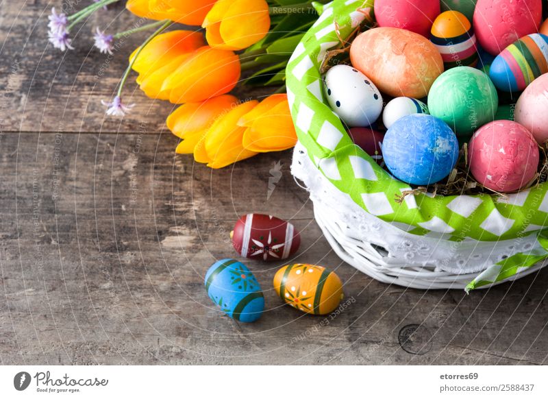 Easter eggs in a basket on wooden background Egg Colour Vacation & Travel Feasts & Celebrations Public Holiday Background picture Guest Decoration Festive Well