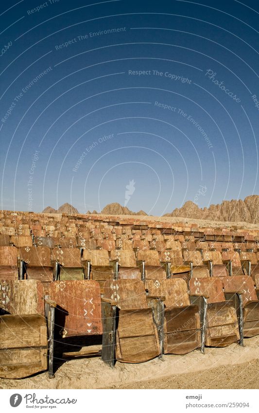 desert cinema Sky Cloudless sky Summer Desert Exceptional Blue Cinema Nature Exterior shot Seat Row of seats Movie hall Dry Colour photo Deserted Copy Space top