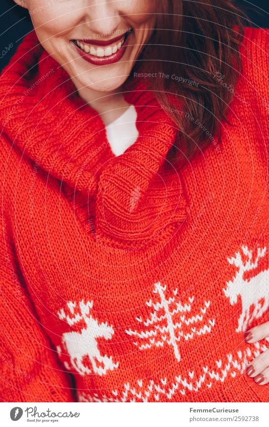 Brunette woman with red deer wool sweater Feminine Young woman Youth (Young adults) Woman Adults 1 Human being 18 - 30 years 30 - 45 years Well-being
